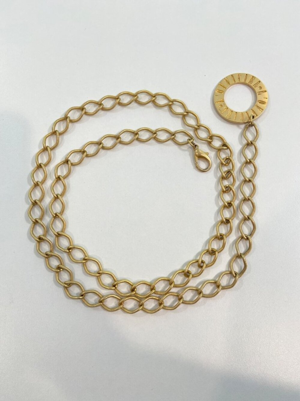 Gold-Tone Chain Belt With Decorative Circular Pendant And Lobster Clasp Closure